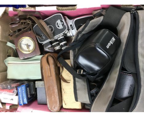 A Collection of vintage photographic equipment including a Nikon F301, Exakta Varex IIb, Bolex Paillard etc. postage category