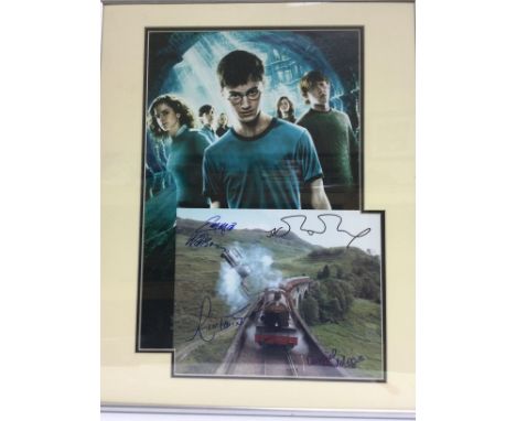 A framed and glazed Harry Potter montage signed by J K Rowling, Daniel Radcliffe, Emma Watson and Rupert Grint. No COA. Appro