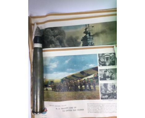 A brass shell case and WW2 British military posters. Shipping category D.