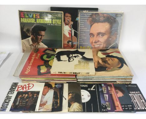 A bag of LPs and 7inch singles by various artists including Elvis Presley, Billy J Kramer, Michael Jackson and others plus a 