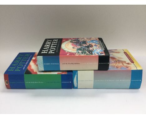 Three first edition Harry Potter books comprising 'Order Of The Phoenix', 'The Deathly Hallows' and 'The Half Blood Prince'. 