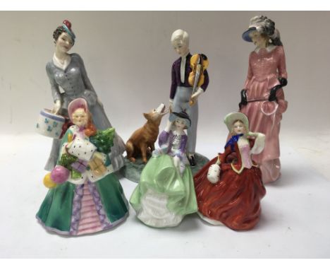 A Collection of figurines five Doulton one Worcester.