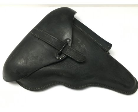 A WW2 German P38 First model hard shell holster. Postage category C