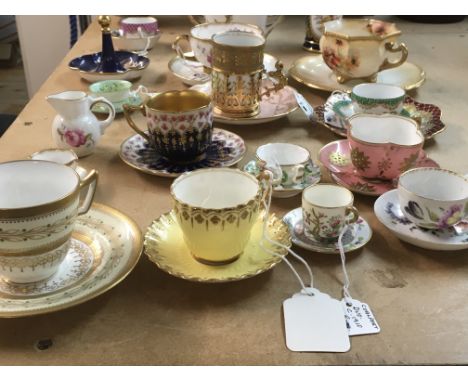 A collection of porcelain Cabinet cups and saucers Including Wedgwood and Doulton.