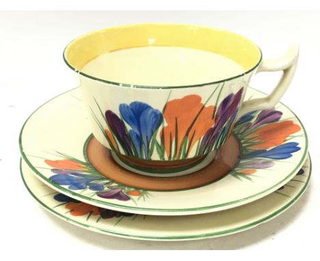 A Clarice Cliff Big Anne cup and saucers, postage category D