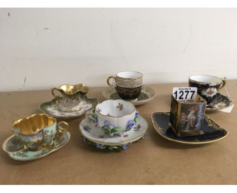 A collection of 6 porcelain cabinet cups including Royal Worcester and Meissen