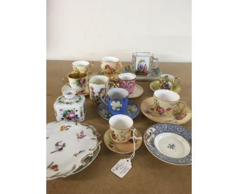 A collection of cabinet cups and saucers including Royal Worcester.