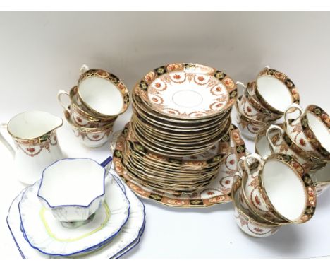 A Shelley cup and saucers,Royal Albert tea set. Postage category D