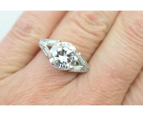 Good diamond ring, the central brilliant cut stone certificated as weighing approx. 2.97cts, K in colour and SI clarity, in p