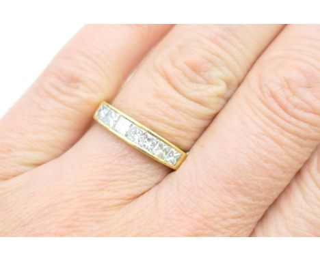 Diamond half eternity ring, set with seven princess cut diamonds totalling approx. 1.05cts, colour estimated as G-H and clari