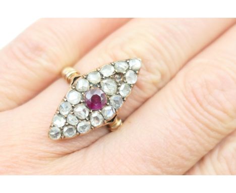 Victorian ruby and diamond marquise cluster ring, circa 1890, the central brilliant cut ruby of approx. 0.25ct pave set withi