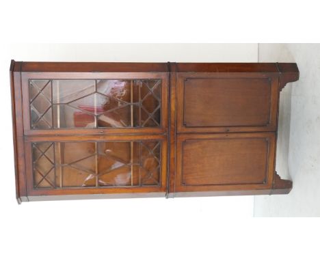 Mahogany free standing corner display cabinet, early 19th Century, having two reeded astragal glazed doors opening to three s