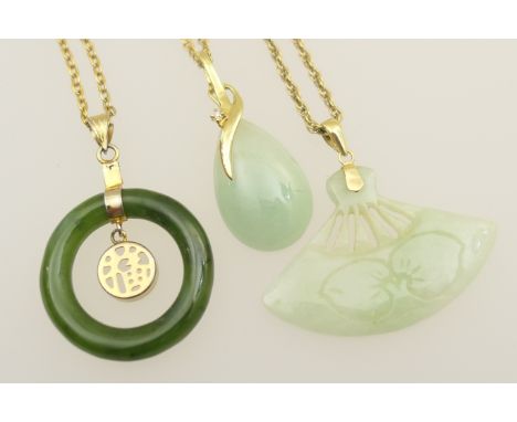 Hong Kong celadon jade and diamond pendant mounted in 14ct gold, suspended from a 9ct gold flat curb link necklace, length 50