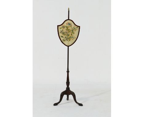 Late Victorian mahogany pole screen with shield shaped banner embroidered with flowers, on a tripod base, height 147cm