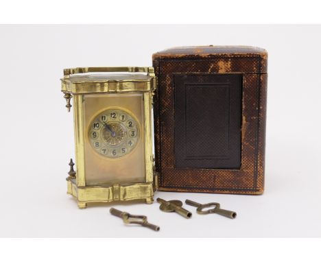 French brass carriage clock, circa 1900, shaped rectangular case with folding handle, gilt coloured dial with Arabic numerals