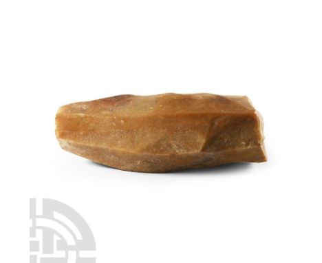 Neolithic Period, 2100-1850 B.C. A well-formed 'livre de beurre' core in yellow-brown flint. See Martin, Dr. H., Etude sur le