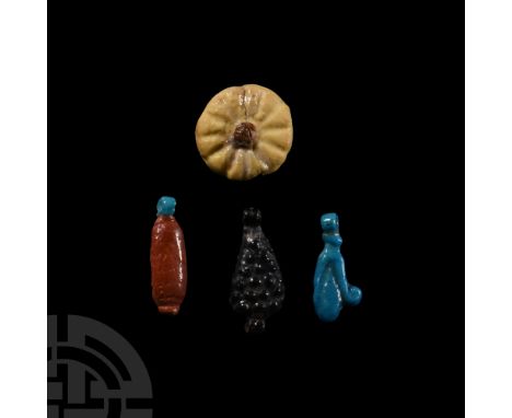 New Kingdom, 1550-1070 B.C. Comprising: black bunch of grapes; red date; blue palmette frond; white daisy rosette. Cf. Andrew