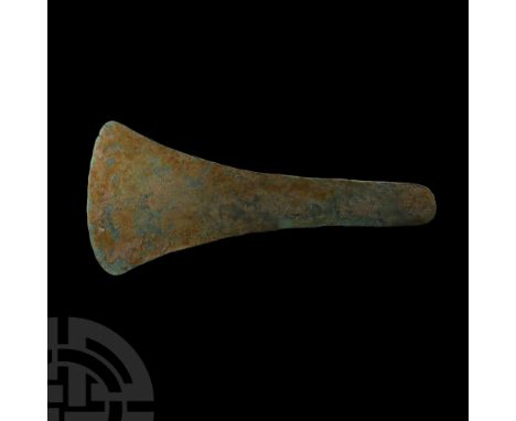 2nd millennium B.C. Flat in cross-section with a convex cutting edge and rounded butt. Cf. Çetin, A., Bilgi, Ö., Weapons of t