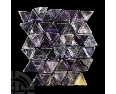 Comprising variously sized translucent specimens in light blue to dark purple colour.  897 grams total, 33-39 mm (1 1/4 - 1 1
