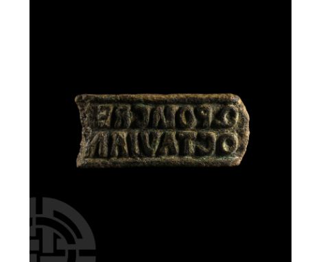 Circa 1st century A.D. Formed as a tablet-shaped stamp (signaculum), with raised border above and below containing an inscrip