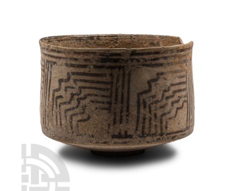 3rd millennium B.C. With slightly tapering profile, basal ring, painted band to the inner rim, frieze of multilinear geometri