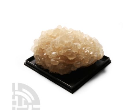 Comprising a mass of light yellow striated short prismatic crystals.  447 grams total, 92 mm wide (3 1/2 in.).From Cumberland