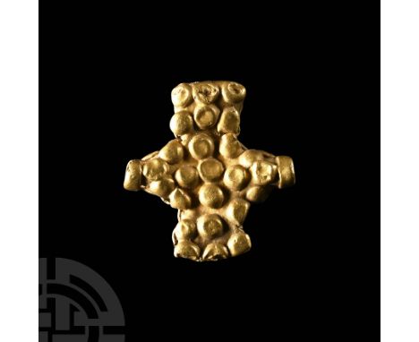 Circa 9th-11th century A.D. or earlier. Sheet-gold bead with applied granules to both flat faces. Cf. Adamsen, C. et al., Sor