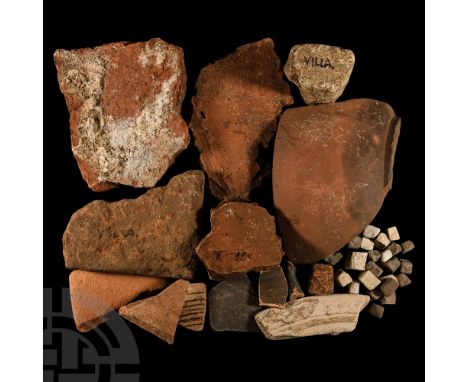 1st-4th century A.D. Comprising large tile and vessel fragments, some with inked notes; and a group of white and grey tessera