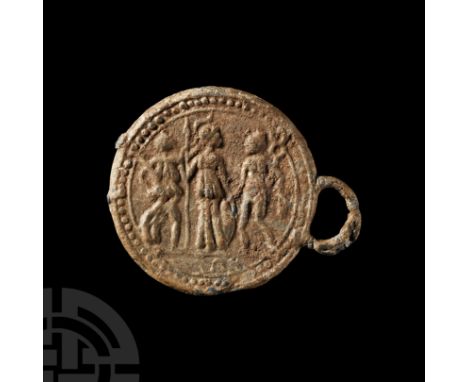 2nd century A.D. Obverse with a beaded border and one loop enclosing an image of three figures: at the centre Minerva wearing