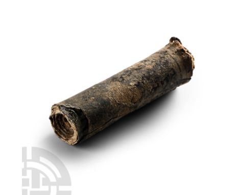 2nd-8th century A.D. Rectangular lead sheet tightly coiled into a scroll with inked Aramaic text to one face. Cf. similar ite
