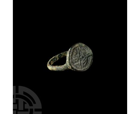 Circa 4th-2nd century B.C. With a D-section hoop, large rounded bezel with a geometric motif.  2.89 grams, 23.01 mm overall, 