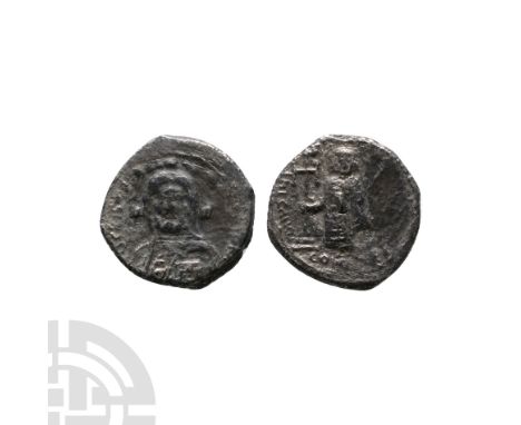 685-695 A.D. Justinian II first reign, Constantinople mint. Obv: IhS CRISTUS REX REGNANTIUM, facing bust of Christ, raising h