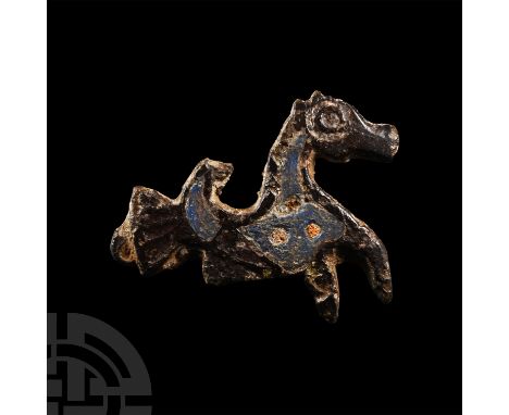 Circa 2nd century A.D. With low-relief eye and tail detailing, cells filled with enamel and roundels in contrasting colour; r