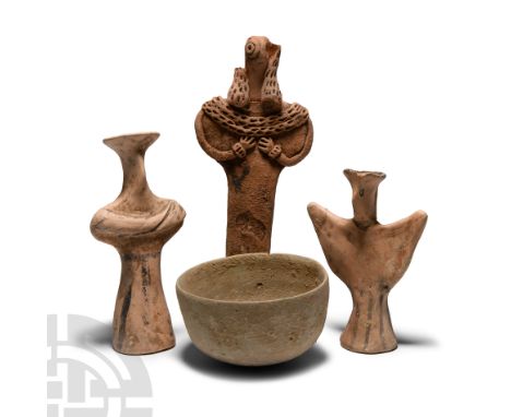 Circa 3000 B.C. and later. Comprising: Mycenaean standing terracotta figure with flared base, applied arms, collar, eyes and 