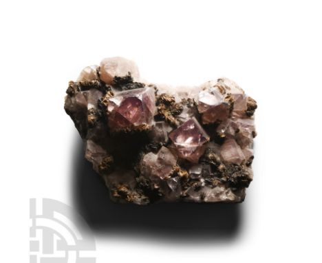 The matrix with well-formed, mainly light-coloured crystals.  823 grams, 13.8 cm (5 3/8 in.).From Cumberland, UK. Collected i