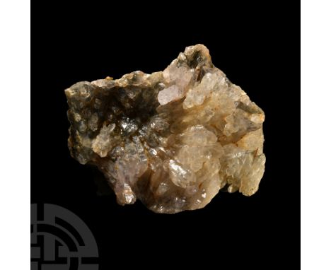 On an irregular matrix, comprising white and light lilac crystals forming a flower-like fanned cluster.  646 grams, 18 cm (7 