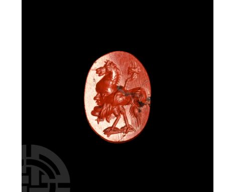 2nd century A.D. Oval in shape; the main subject of the gryllos a youth wearing a horse-head topped helmet, the body a ram's 