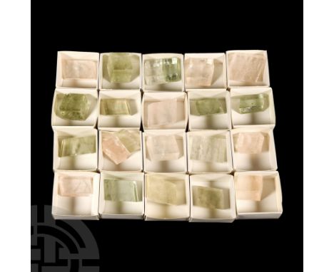 The colours ranging from light pink and green to light brown; each in a cardboard tray.  335 grams total, 19-32 mm (3/4 - 1 1