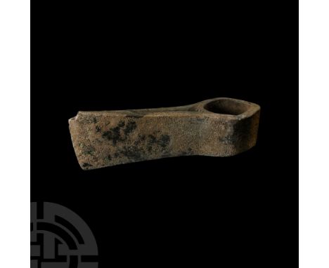 12th-11th century B.C. With elliptical socket and slightly flaring cheeks with cutting edge.  939 grams, 17.5 cm (6 7/8 in.).