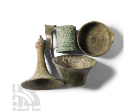 1st-4th century A.D. Including a drum-shaped pyxide, trumpet-shaped stand, P-shaped bow brooch and other items.  552 grams to