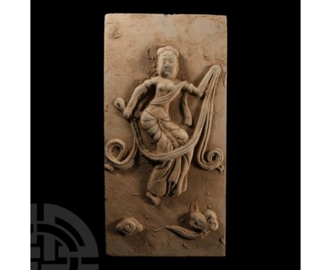 Song Dynasty, circa 960-1279 A.D. Circular recess with high-relief modelled figure of Mah?k?la sitting cross-legged on a lotu