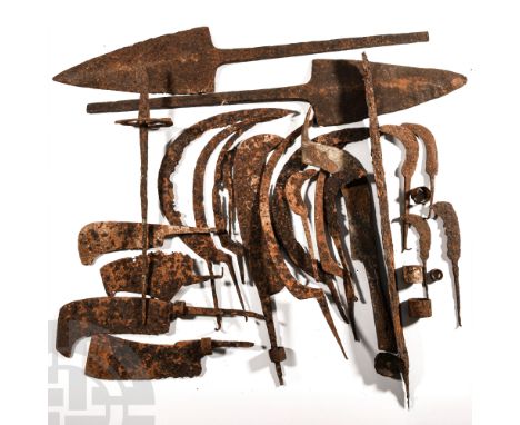 Circa 15th-16th century A.D. Group including a sickles, bill-hooks, knives and other tools.  8 kg total, 3-66.5 cm (1 1/8 - 2