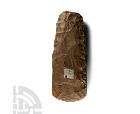 Neolithic Period, 5th-3rd millennium B.C. Bifacially knapped with convex cutting edge, gently tapering profile with squared s