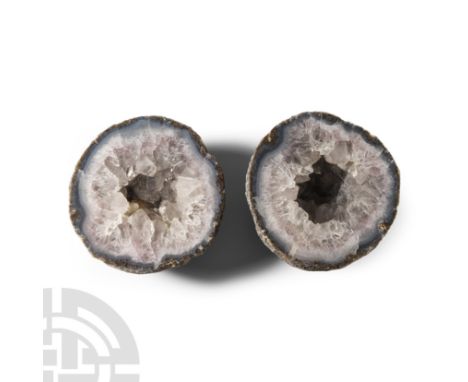The exposed inner cavity filled with clear quartz and light-coloured amethyst crystals.  1.4 kg total, 10.7-10.8 cm (4 1/4 in