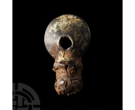 1st century B.C.-1st century A.D. Comprising a ferrous shank and bronze finial formed as a waisted bulb and biconvex disc wit