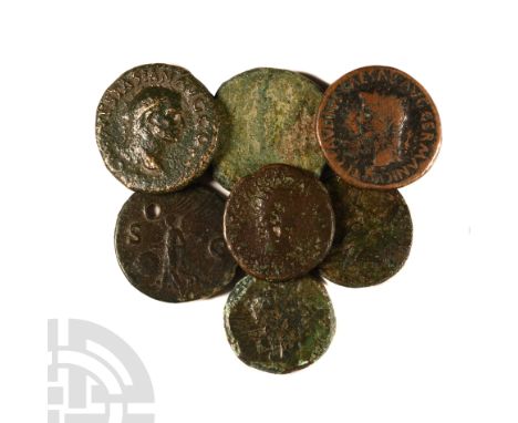 1st-2nd century A.D. Group comprising: various bronze as and a sestertii including Claudius, Nero, and Vespasian; various iss