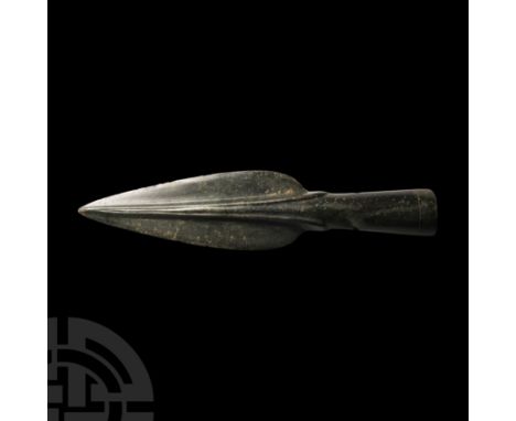 Circa 9th-7th century B.C. Leaf-shaped blade with a ribbed raised central ridge. Cf. MacGregor, A., Antiquities from Europe a