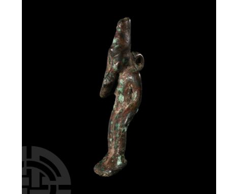 Late Period, 664-332 B.C. Modelled in the round with suspension loop to the reverse, with double crown and sidelock of youth.