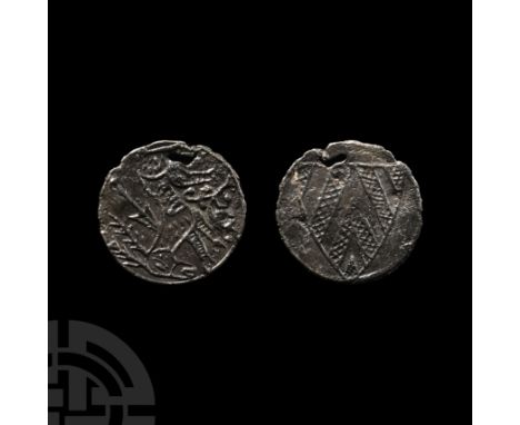 Circa 14th-15th century A.D. Recto with running stag and arrow piercing the neck; verso with heater shield, hatched chevrons 