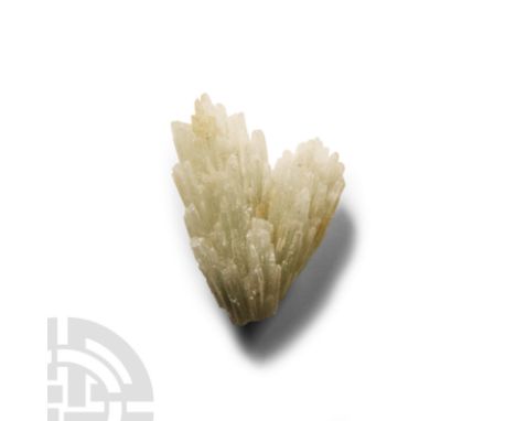 Comprising a radiating cluster of thin white and light-green crystals.  13.7 grams, 38 mm (1 1/2 in.).From Italy. Collected i